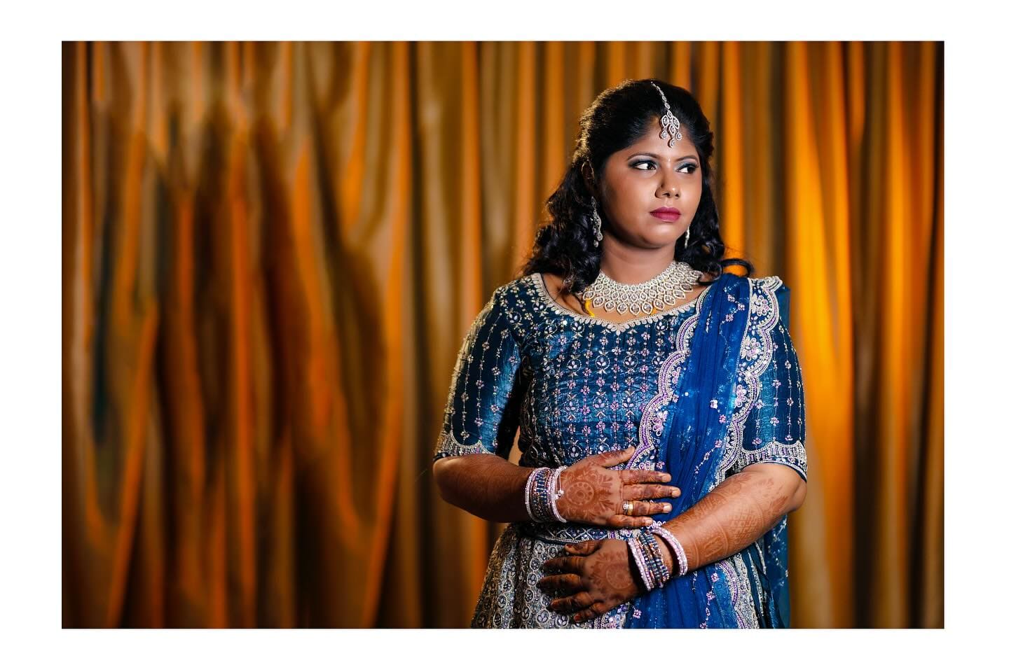 Bridal portrait in blue lehenga